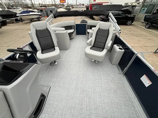 Slide: The Image of 2024 Harris Cruiser 210 CWDH pontoon boat interior with spacious seating and modern design. - 10