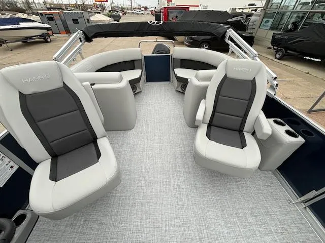 Slide: The Image of 2024 Harris Cruiser 210 CWDH pontoon boat interior with gray and black seating. - 12