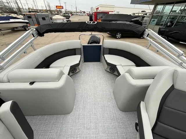 Slide: The Image of 2024 Harris Cruiser 210 CWDH pontoon boat interior with gray seating and flooring. - 13