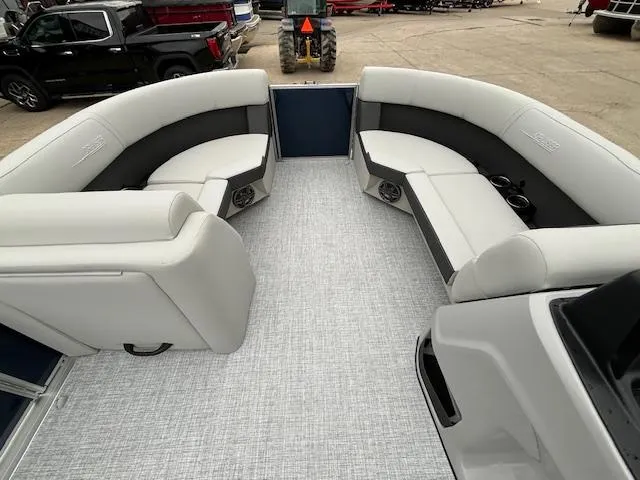 Slide: The Image of 2024 Harris Cruiser 210 CWDH pontoon boat interior with spacious seating and modern design. - 22