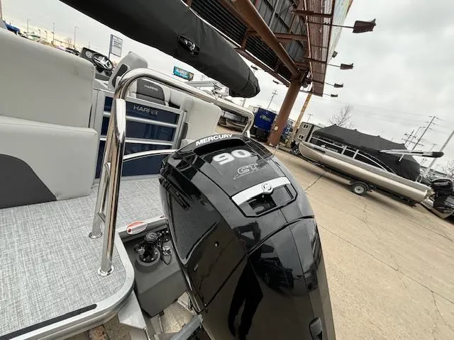 Slide: The Image of 2024 Harris Cruiser 210 CWDH pontoon boat with Mercury 90 HP outboard motor. - 4