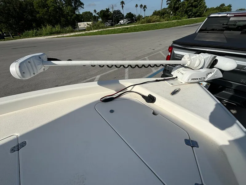 Slide: The Image of 2014 ShearWater 25LTZ boat with Minn Kota trolling motor on deck. - 16