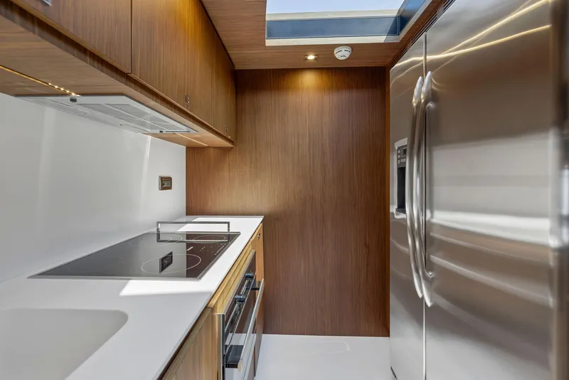 Slide: The Image of Modern kitchen in 2016 Riva 88' Domino Super yacht with stainless steel appliances. - 43