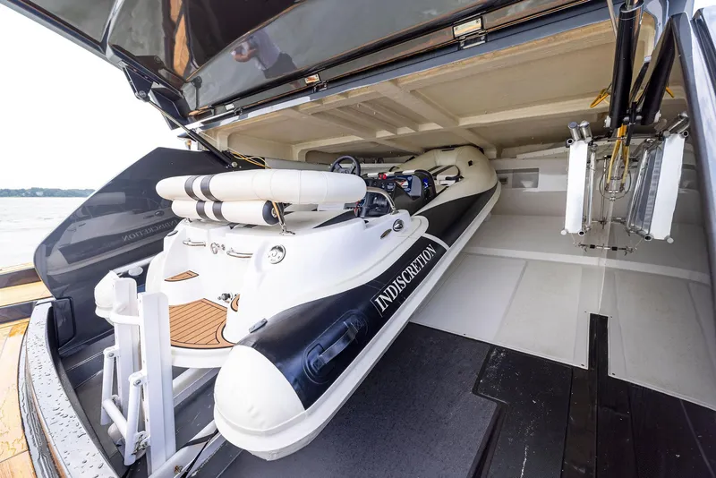 Slide: The Image of Riva 88' Domino Super 2016 yacht with tender in garage. - 21