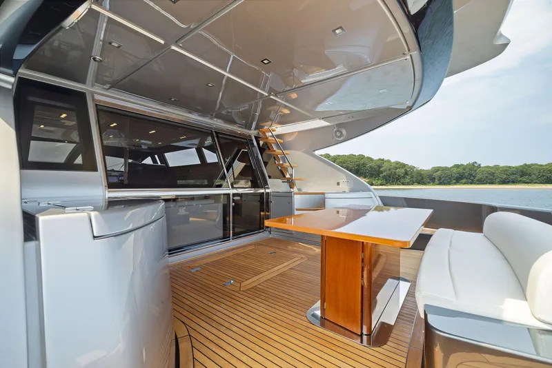 Slide: The Image of Luxury deck of 2016 Riva 88' Domino Super yacht with seating and table. - 28