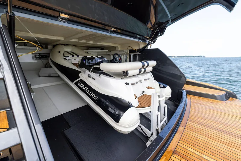 Slide: The Image of 2016 Riva 88' Domino Super yacht with tender in garage. - 20