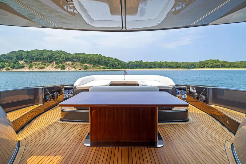 Slide: The Image of Luxury deck of 2016 Riva 88' Domino Super yacht with scenic water view. - 22