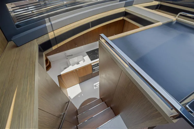 Slide: The Image of Interior view of 2016 Riva 88' Domino Super yacht kitchen and stairs. - 41