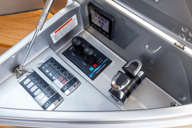 Slide: The Image of Control panel of a 2016 Riva 88' Domino Super yacht with joysticks and display. - 25