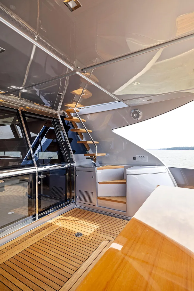 Slide: The Image of Luxury interior of 2016 Riva 88' Domino Super yacht with wooden flooring. - 26