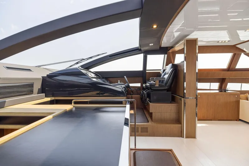 Slide: The Image of Interior helm station of 2016 Riva 88' Domino Super yacht with modern design. - 37