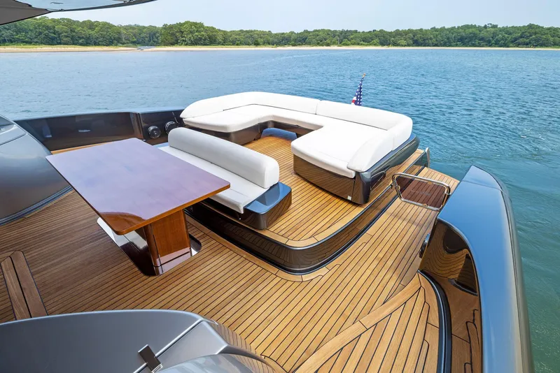 Slide: The Image of Luxurious deck of 2016 Riva 88' Domino Super yacht with seating and dining area. - 15