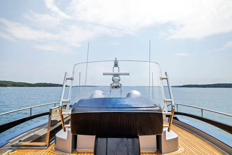 Slide: The Image of Riva 88' Domino Super 2016 yacht on calm waters with clear sky. - 13