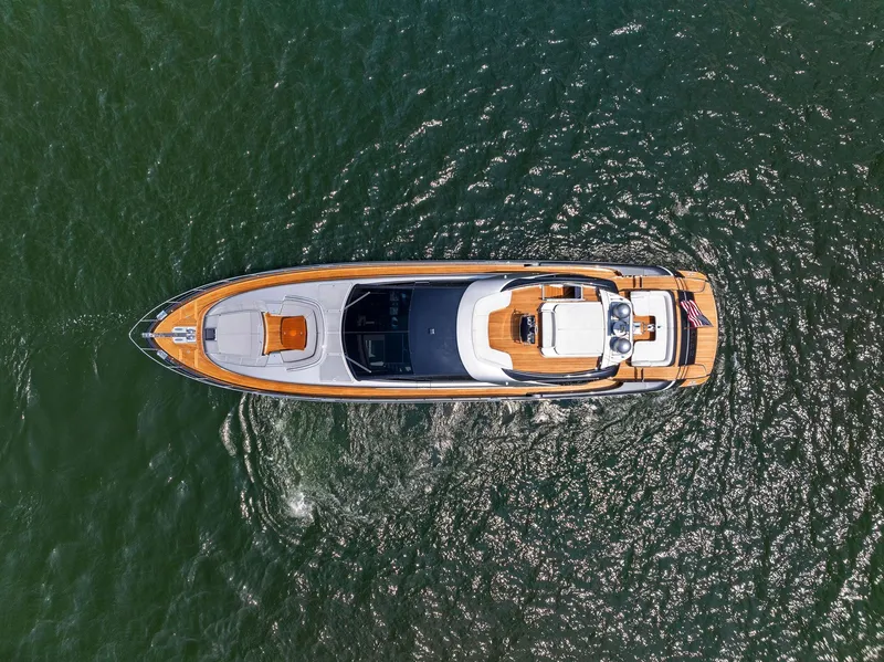 Slide: The Image of Aerial view of 2016 Riva 88' Domino Super yacht cruising on water. - 8