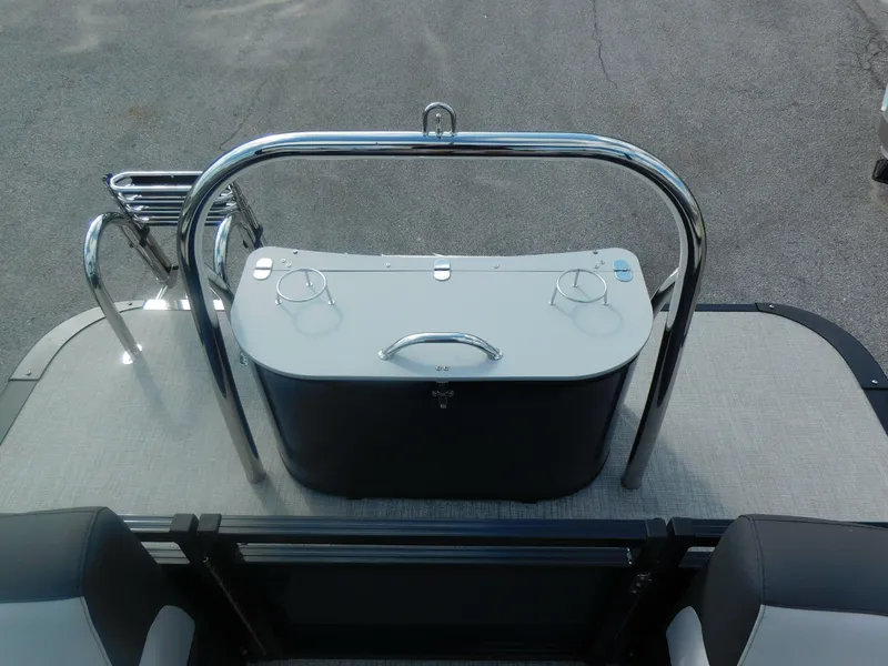 Slide: The Image of 2024 Avalon LSZ Quad Lounger rear view with stainless steel rail and storage compartment. - 16