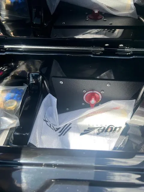 Slide: The Image of 2024 ATX Surf Boats 22 Type-S storage compartment with accessories. - 17