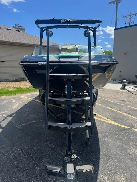 Slide: The Image of 2024 ATX Surf Boats 22 Type-S on trailer in parking lot. - 3