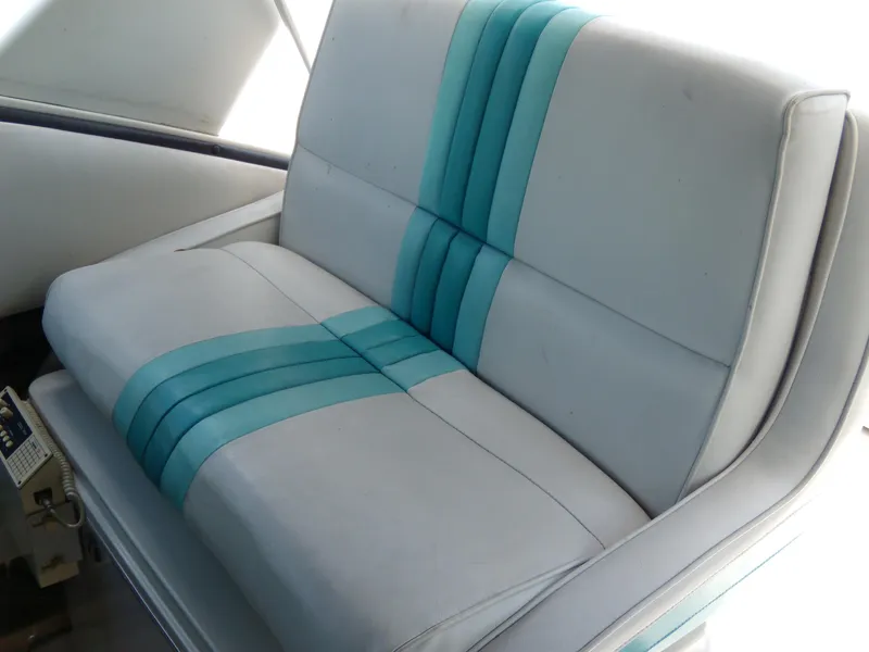 Slide: The Image of White and teal seat on 1988 Wellcraft St. Tropez 3200 boat. - 12