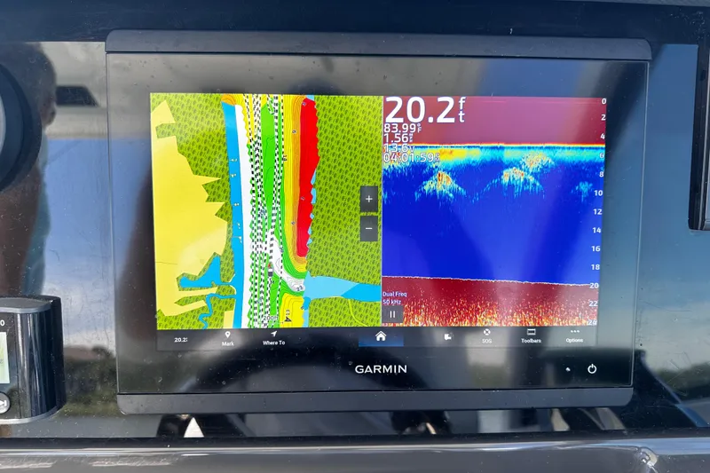 Slide: The Image of Garmin navigation and fish finder display on 2021 Blackfin 252 DC boat. - 13