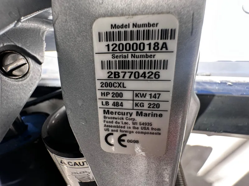 Slide: The Image of 2021 Blackfin 252 DC engine label with model and serial numbers, Mercury Marine 200CXL, 200 HP. - 39