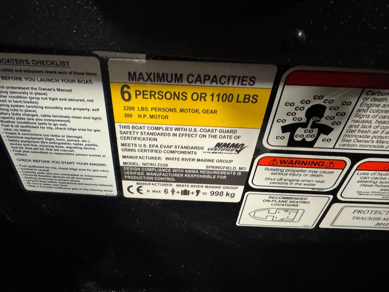 Slide: The Image of 2024 Nitro ZV20 Pro capacity label: 6 persons or 1100 lbs, 300 HP motor warning. - 15