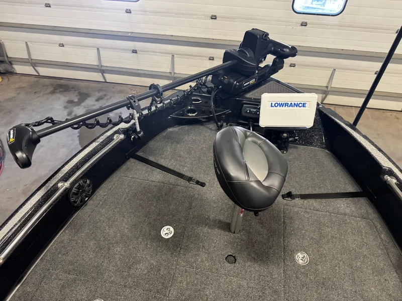 Slide: The Image of 2024 Nitro ZV20 Pro boat interior with Lowrance electronics and trolling motor. - 16