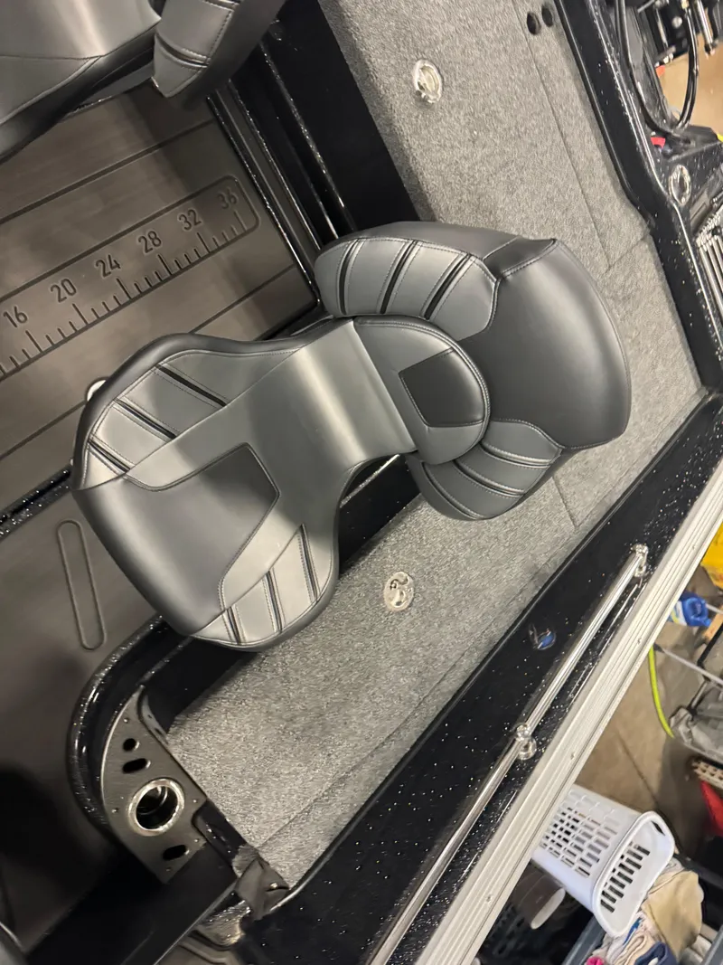 Slide: The Image of 2024 Nitro ZV20 Pro boat seat with sleek black and gray design. - 9