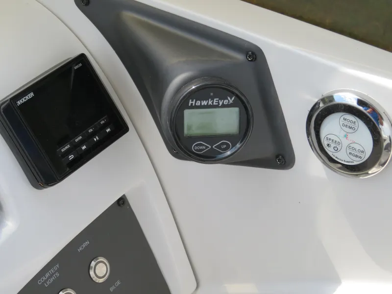 Slide: The Image of Control panel of 2022 Tahoe 210 S Limited boat with HawkEye display. - 12