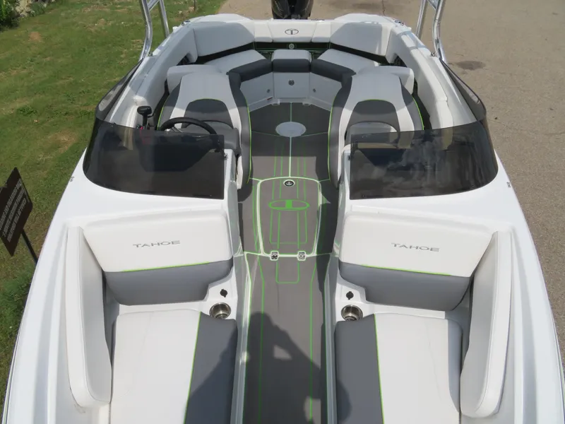 Slide: The Image of 2022 Tahoe 210 S Limited boat interior with seating and steering console. - 14