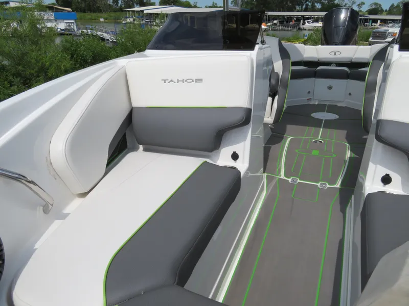 Slide: The Image of 2022 Tahoe 210 S Limited boat interior with gray and white seating. - 15