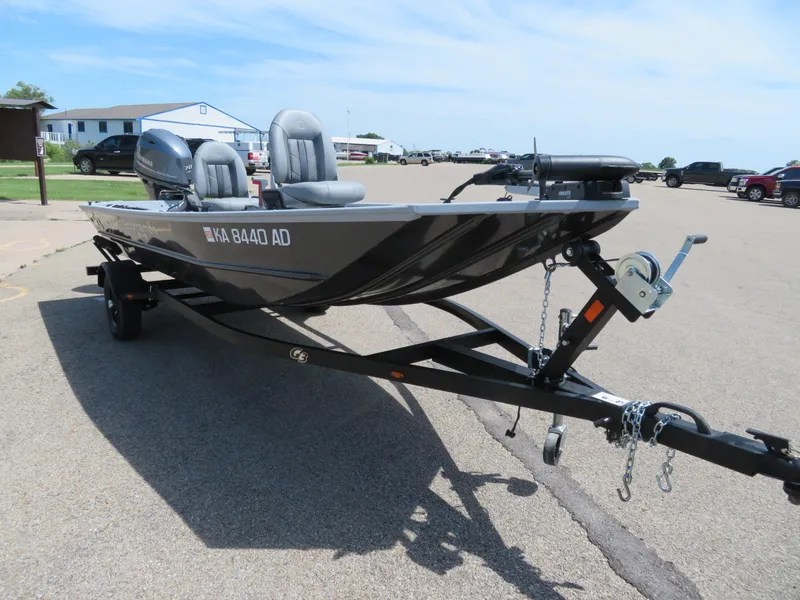 Slide: The Image of 2023 G3 Sportsman 1610 SS fishing boat on a trailer in a parking lot. - 11