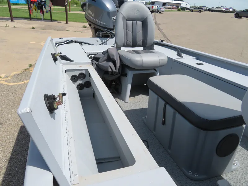 Slide: The Image of 2023 G3 Sportsman 1610 SS boat interior with storage compartments and seating. - 12