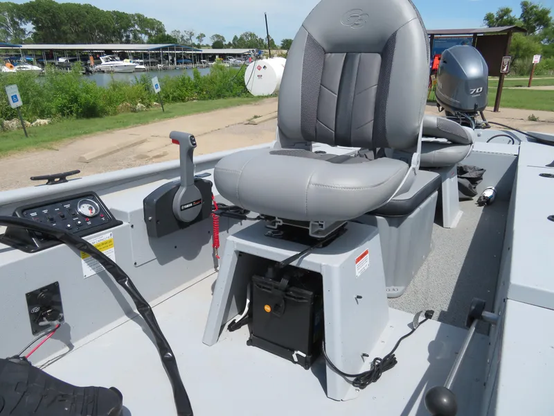 Slide: The Image of 2023 G3 Sportsman 1610 SS boat interior with captain's chair and control panel. - 4
