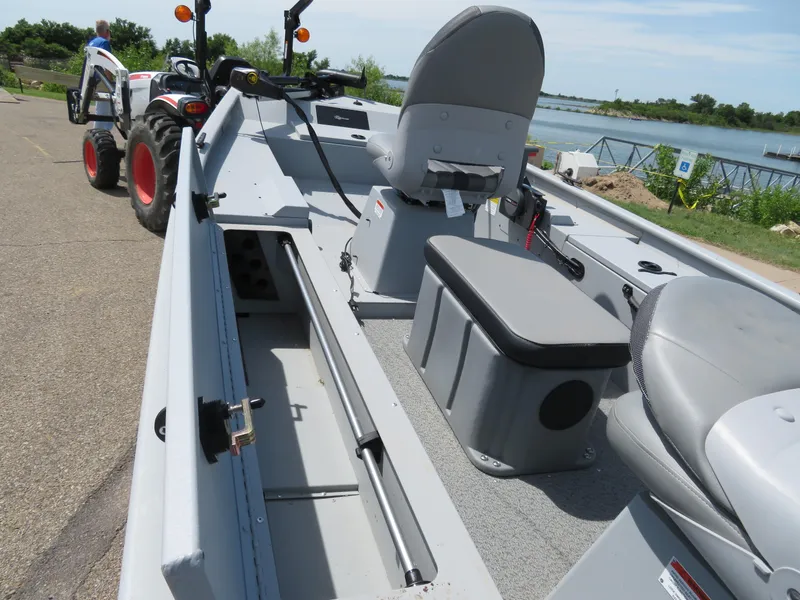 Slide: The Image of 2023 G3 Sportsman 1610 SS fishing boat interior with seating and storage compartments. - 5