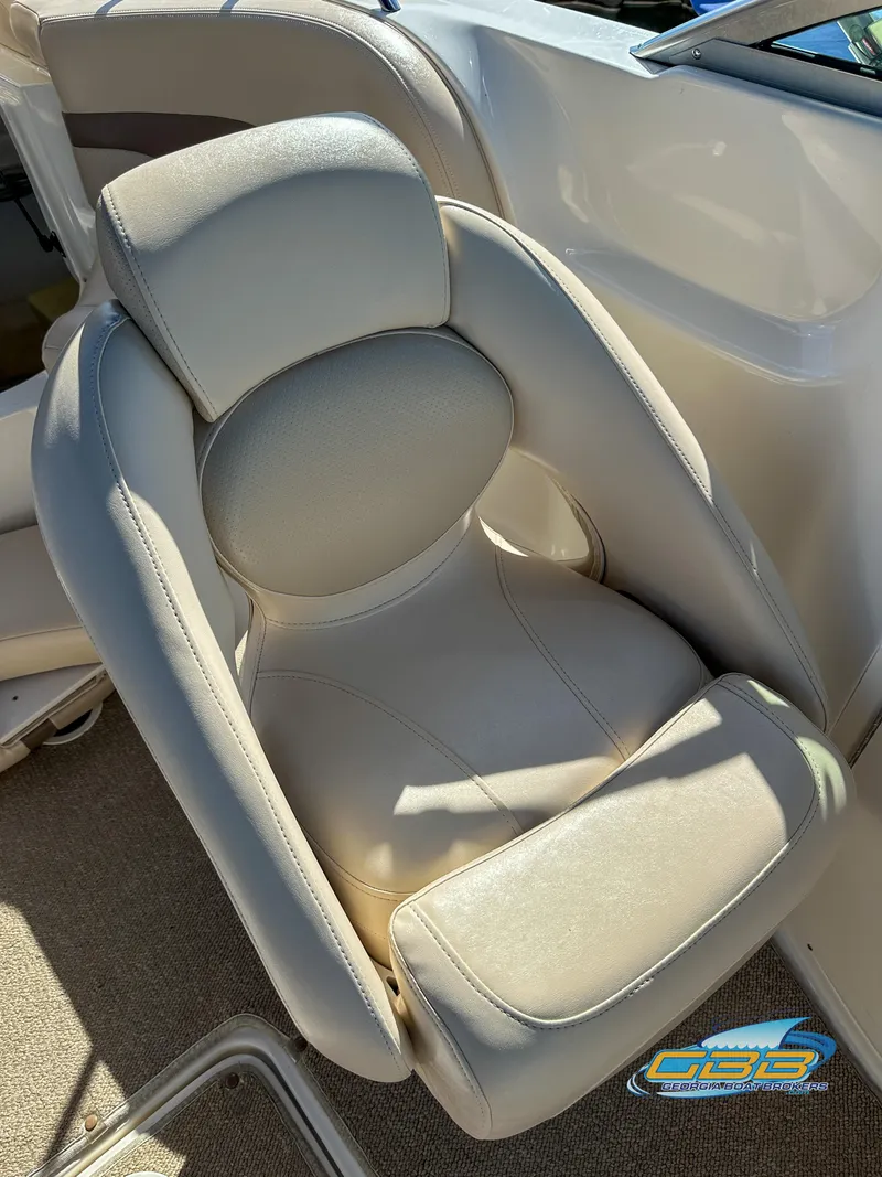 Slide: The Image of 2006 Chaparral Sunesta 236 boat seat in beige leather upholstery. - 28