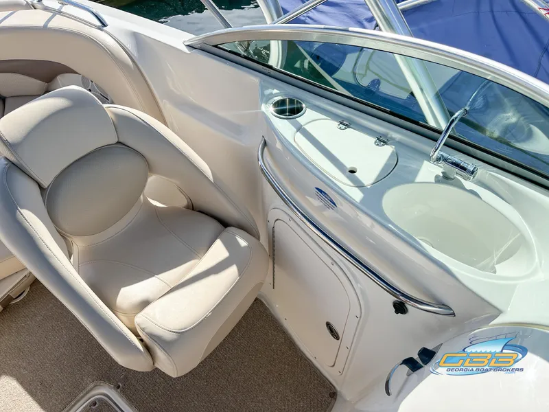 Slide: The Image of 2006 Chaparral Sunesta 236 boat interior with seating and sink. - 30