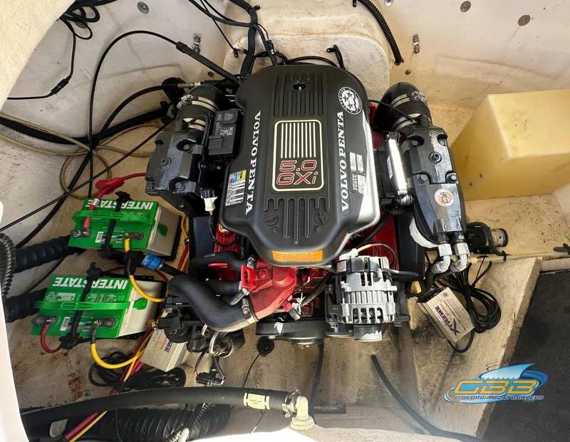 Slide: The Image of 2006 Chaparral Sunesta 236 boat engine compartment with Volvo Penta 5.0 GXI engine. - 31