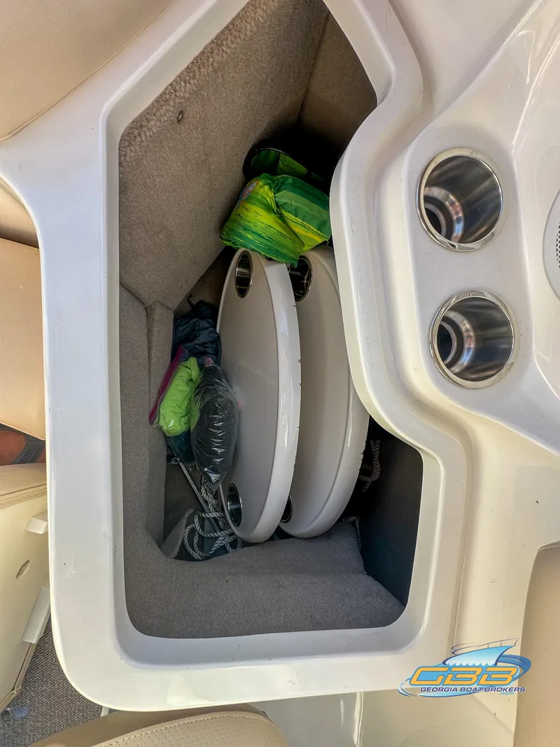 Slide: The Image of Storage compartment in 2006 Chaparral Sunesta 236 boat with accessories. - 33