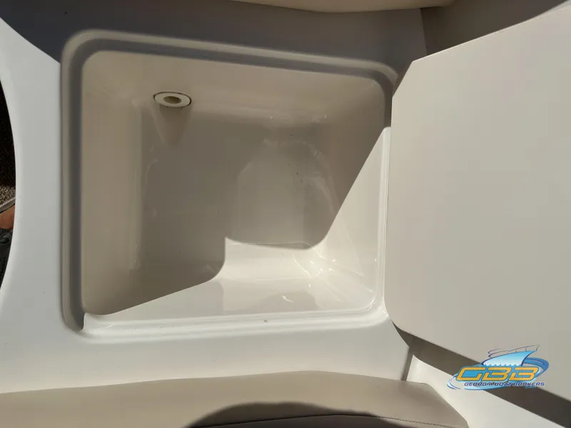 Slide: The Image of 2006 Chaparral Sunesta 236 boat storage compartment. - 35