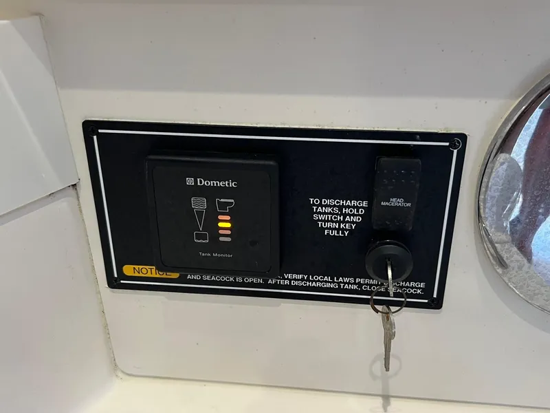 Slide: The Image of Control panel on a 2017 Pursuit OS 355 Offshore boat with Dometic system. - 37