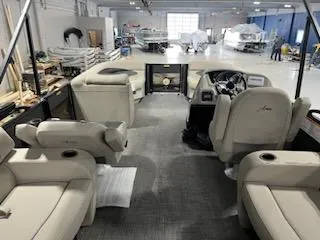 Slide: The Image of 2024 Barletta ARIA 20QC pontoon boat interior in a showroom. - 14