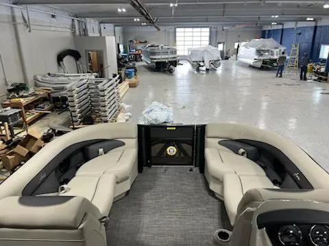Slide: The Image of 2024 Barletta ARIA 20QC pontoon boat interior in a manufacturing facility. - 16