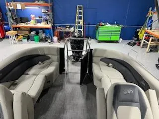 Slide: The Image of 2024 Barletta ARIA 20QC pontoon boat interior in a workshop. - 17