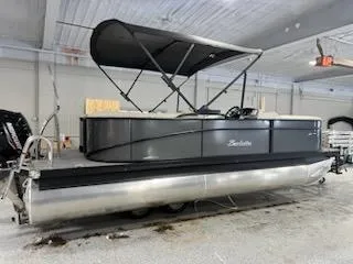 Slide: The Image of 2024 Barletta ARIA 20QC pontoon boat in a showroom. - 3