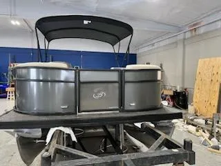 Slide: The Image of 2024 Barletta ARIA 20QC pontoon boat in a workshop. - 4