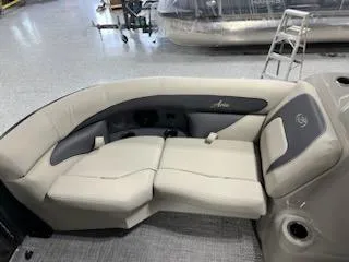 Slide: The Image of 2024 Barletta ARIA 20QC boat interior seating in a showroom. - 8