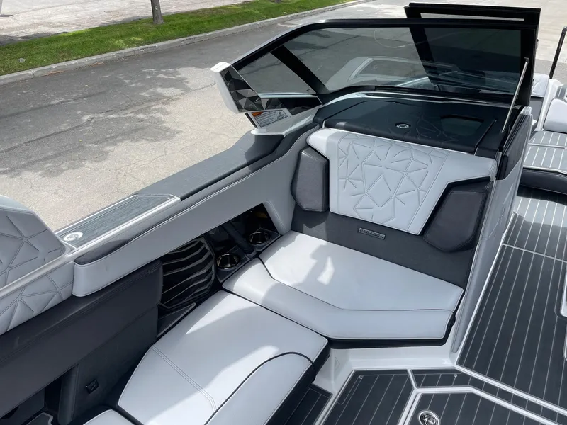 Slide: The Image of 2023 Nautique Super Air Nautique G23 Paragon interior with luxurious seating and modern design. - 11