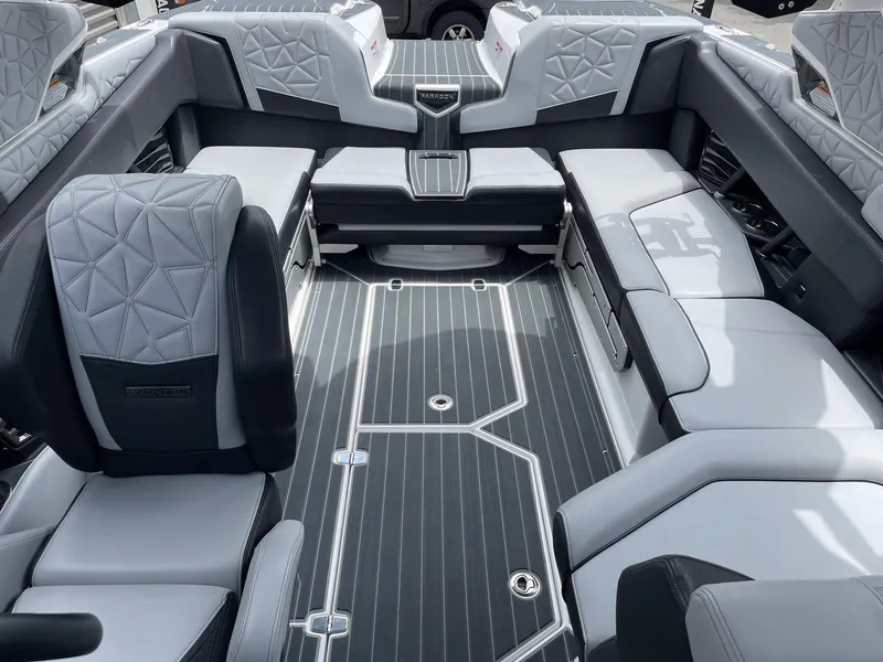 Slide: The Image of 2023 Nautique Super Air Nautique G23 Paragon interior with luxurious seating and modern design. - 13