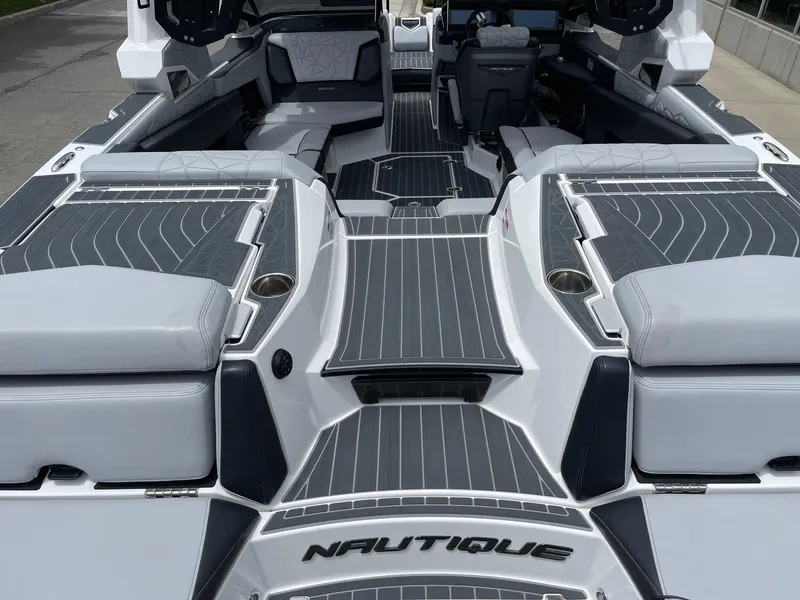 Slide: The Image of 2023 Nautique Super Air Nautique G23 Paragon interior with luxurious seating and modern design. - 5