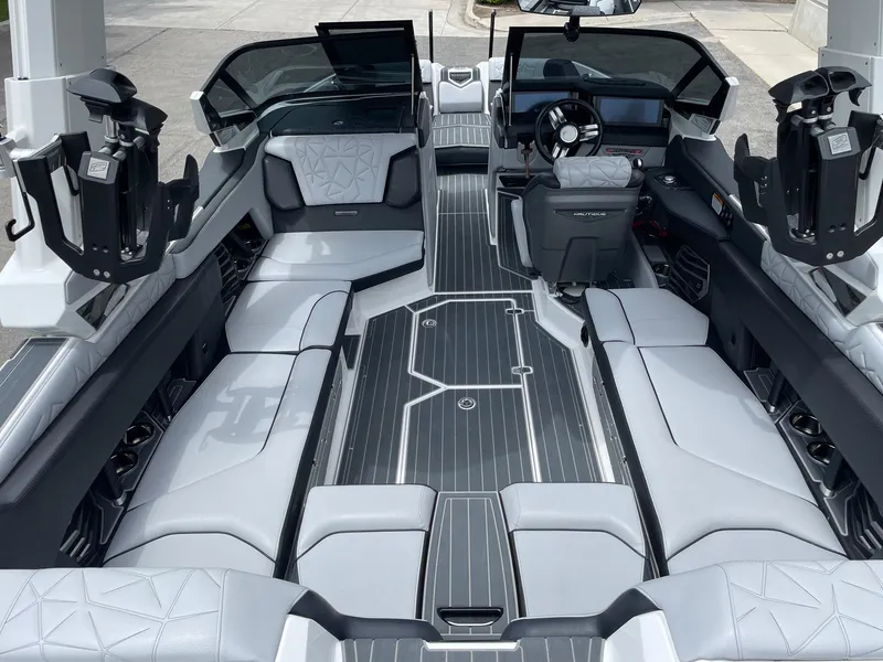 Slide: The Image of 2023 Nautique Super Air Nautique G23 Paragon interior, luxury seating, advanced dashboard. - 6